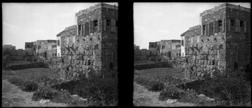 Old Crusades wall with houses superimposed, Tartous [picture] : [Syria, World War II] / [Frank Hurley]