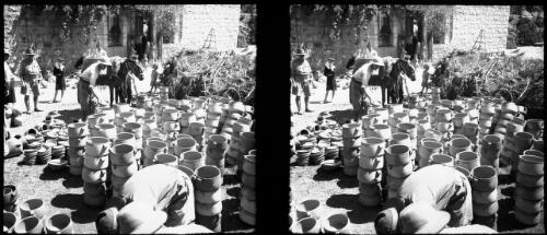 Peep in Syria, crusader town? [figures, pottery] [picture] : [Syria, World War II] / [Frank Hurley]