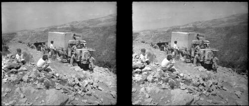 Getting out French artillery in Mts Sth Beirut [figures in military uniform around truck] [picture] : [Lebanon, World War II] / [Frank Hurley]