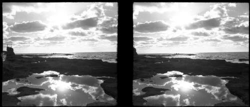 Lattique [Latikia, coastal scene, rocks and sea] [picture] : [Syria, World War II] / [Frank Hurley]