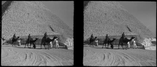 Typical way of sightseeing around the pyramids [camels, Egypt] [picture] : [Egypt, World War II] / [Frank Hurley]