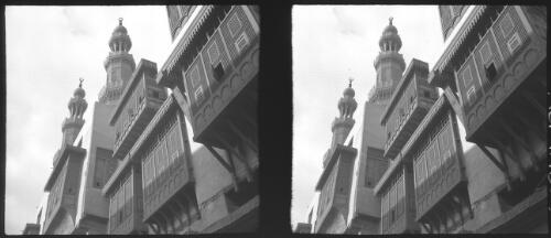 Bab Zuela Mosque Cairo [looking up to the minarets, Mashrabiyya screen windows] [picture] : [Egypt, World War II] / [Frank Hurley]