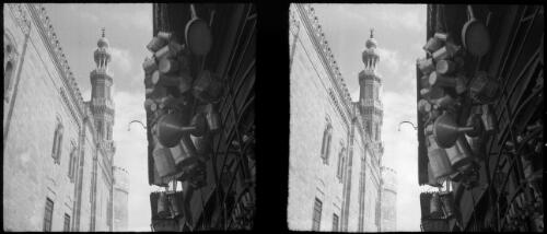 Cairo [looking up, a tower on the left, pots and pans on the right] [picture] : [Egypt, World War II] / [Frank Hurley]