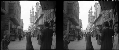 Old Cairo [street scene, minarets on the right] [picture] : [Egypt, World War II] / [Frank Hurley]