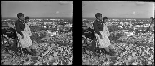 Derna [two boys leaning against a cart] [picture] : [Libya, World War II] / [Frank Hurley]