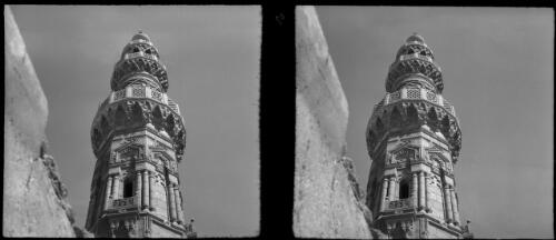 Scenes among the Mausolea of the Dead City of Eastern Cemetery Cairo, also called The Tombs of the Khalifes, "A looking up view" of beautiful stonework on Minaret Qait-Bay Tomb of Khalifes [picture] : [Egypt, World War II] / [Frank Hurley]