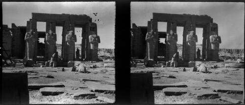 Luxor scenes in the Ramesseum, the mortuary Temple of Rameses 2nd [four columns with statues] [picture] : [Egypt, World War II] / [Frank Hurley]