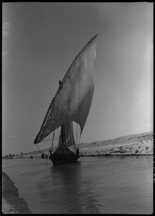 Sailing down the freshwater canal to Ismalia [close-up of boat] [picture] : [Egypt, World War II] / [Frank Hurley]