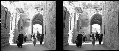 Byways & alleys in Jerusalem including St Stephens Gate & Jaffa Gate [interior view of gateway, Palestine] [picture] / [Frank Hurley]
