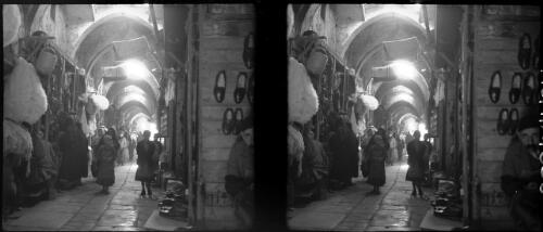 Byways & alleys in Jerusalem including St Stephens Gate & Jaffa Gate [shops in an alleyway, Palestine] [picture] / [Frank Hurley]