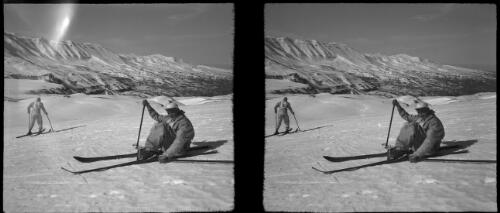 On the snow playground of the Lebanons, at the Cedars [two figures on skis, one seated] [picture] : [Lebanon, World War II] / [Frank Hurley]