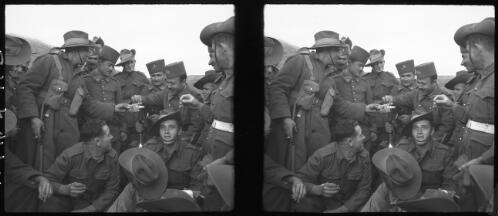 [Australian troops fraternise with free French forces near the town of Quassab (Kassab)] [picture] : [Syria, World War II] / [Frank Hurley]