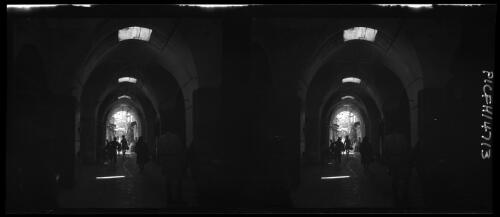 [Covered street, archway, figures] [picture] / [Frank Hurley]