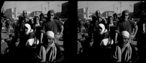 Aleppo [street scene, group of men] [picture] : [Syria, World War II] / [Frank Hurley]