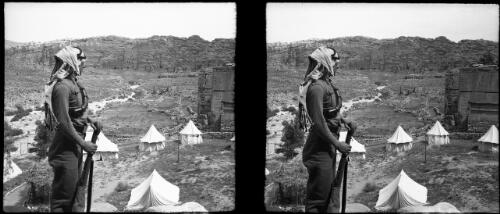 Arab Legionnaire on guard, Petra camp [picture] : [Jordan, World War II] / [Frank Hurley]