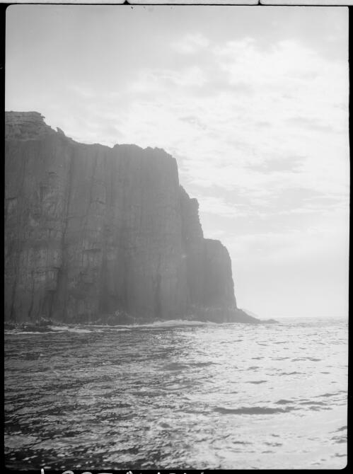 [Rocky cape or bluff and sea, Maatsuyker Island] [picture] : [Maatsuyker Island, Tasmania] / [Frank Hurley]