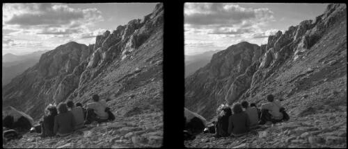 [Group of figures looking down into valley from mountain] [picture] : [Tasmania] / [Frank Hurley]