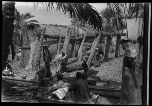 Vista in Chubaish village, Euphrates swamp near Qurna figures in canoes, 1944] [picture] : [Iraq, World War II] / [Frank Hurley]