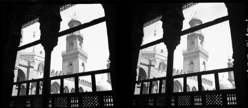 Minaret of Qalaun, also another vista showing Qalaun in distance [mausoleum, through archways] [picture] : [Cairo, Egypt, World War II] / [Frank Hurley]