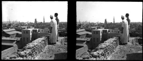 Looking down onto Tombs Mamelukes Cairo [Mamluks, with two figures] [picture] : [Cairo, Egypt, World War II] / [Frank Hurley]