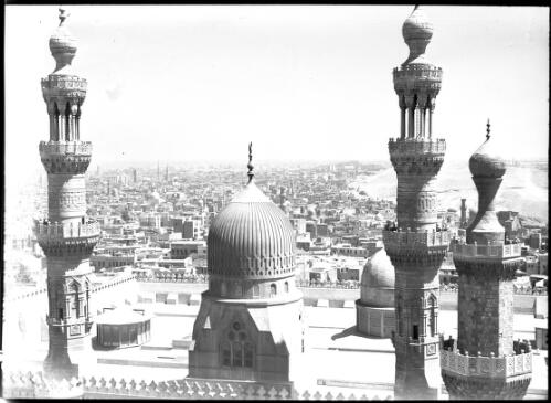 View from Sultan Hassan Minaret looking over roof & minaret of Er Rifa'ay Mosque [picture] : [Cairo, Egypt, World War II] / [Frank Hurley]