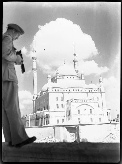 Mosque of Mohammed Aly 1810 [a man in military uniform with a camera on left, Muhammad Ali Mosque] [picture] : [Cairo, Egypt, World War II] / [Frank Hurley]