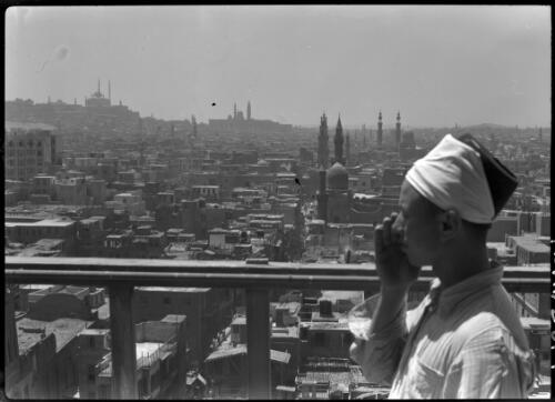 [Cairo viewed from a height, with a muezzin calling] [picture] : [Cairo, Egypt, World War II] / [Frank Hurley]
