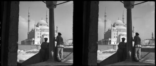 Two figures are looking at Mahommed Aly Mosque [Muhammad Ali Mosque, Cairo] [picture] : [Egypt, World War II] / [Frank Hurley]