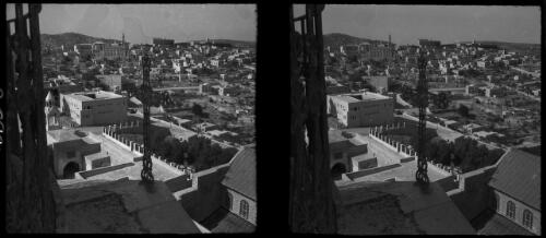 [Bethlehem from the belfrey of the Church of the Nativity, with intricate metal cross, ca. 1942] [picture] / [Frank Hurley]