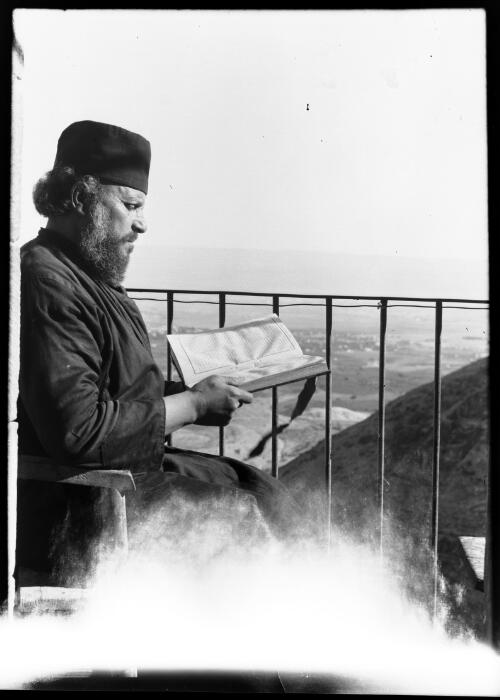 Priest of orthodox Greek Monastery Mt Quarantina Jordan valley [vertical] [picture] / [Frank Hurley]