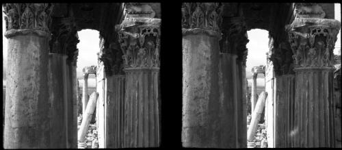 Fallen Column Temple of Baalbek [view through two colonnades, with details of the carved portico ceiling] [picture] : [Lebanon, World War II] / [Frank Hurley]
