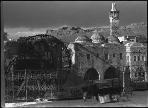 Waterwheels, Hama Syria [view from balcony across Orontes River] [picture] : [Syria, World War II] / [Frank Hurley]