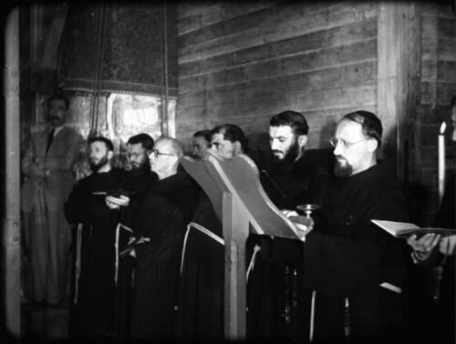 The Latin Service, Church of the Holy Sepulchre [priests at pulpit] [picture] / [Frank Hurley]