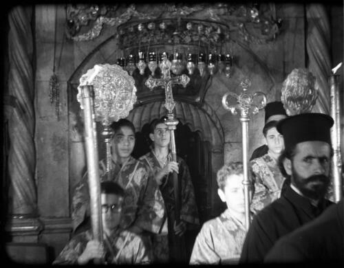 Greek Service in  Holy Sepulchre [ceremonial procession] [picture] / [Frank Hurley]