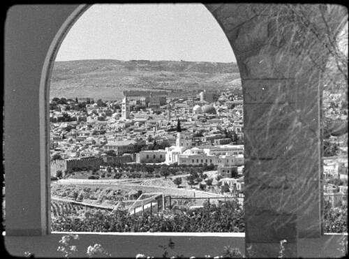 The Hebrew Medical School University Library [Jerusalem, view of town as framed through an archway] [picture] / [Frank Hurley]