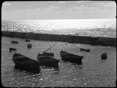 Palestine Potash and Dead Sea [boats moored in front of weir?, 1] [picture] / [Frank Hurley]