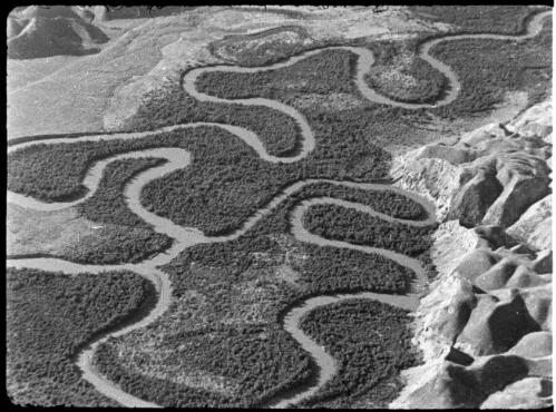 [Aerial view of meandering river, 1] [picture] / [Frank Hurley]