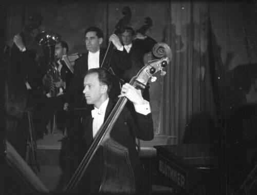 [Three double-bass players, 2] [picture] / [Frank Hurley]