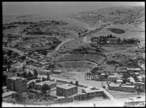[General view from the Citadel of Amman, Jordan overlooking the remains of the Roman theatre and Forum (built 2nd century AD)] [picture] / [Frank Hurley]