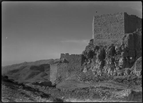 [Remains of towers of unidentified Crusader castle and surrounding landscape, Middle East] [picture] / [Frank Hurley]