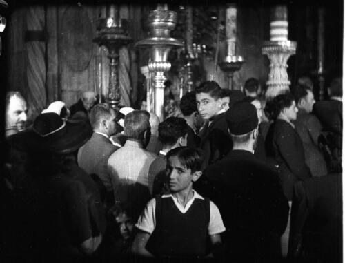 The Armenian Service, Church of the Holy Sepulchre [churchgoers within the church] [picture] / [Frank Hurley]