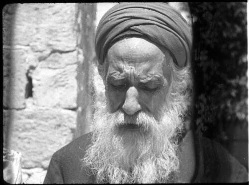 Scenes Nablus, also the Samaritans & Sacred roll & soap making [a Samaritan priest of Nablus] [picture] / [Frank Hurley]