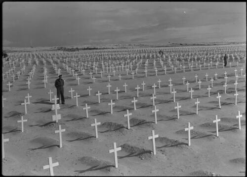 El Alamein Cemetry [cemetery with several figures] [picture] : [Jordan] / [Frank Hurley]