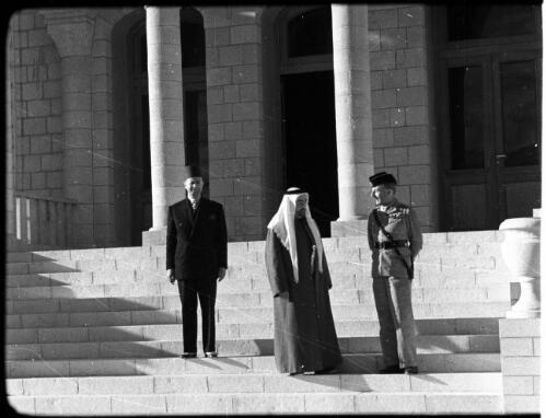 Emir [three dignitaries on the steps of Emir Abdulla's palace] [picture] : [Jordan] / [Frank Hurley]