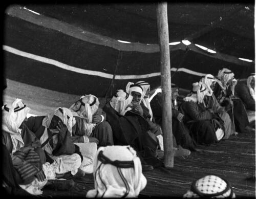 Kerak [tent interior with Bedouins] [picture] : [Jordan] / [Frank Hurley]