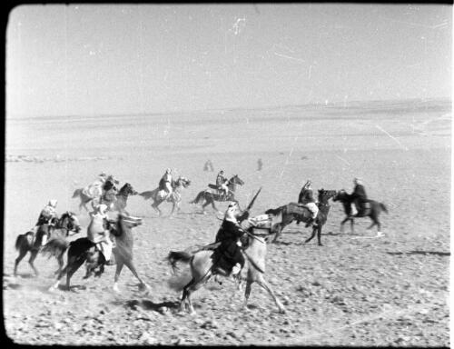 Kerak [group of Bedouins on horseback] [picture] : [Jordan] / [Frank Hurley]