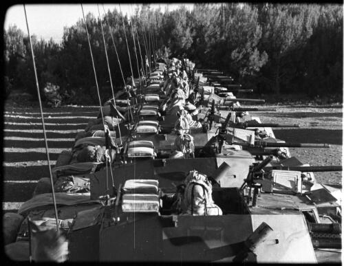 Arab Legion [legionnaires manning a line of tanks, 1] [picture] : [Jordan] / [Frank Hurley]