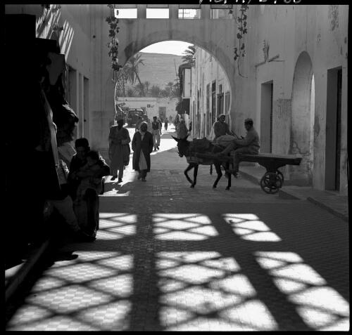 Sunlight in Bazaar Derna Cyrenaica [ca. 1940-1946] [picture] : [Barqah, Libya] / [Frank Hurley]