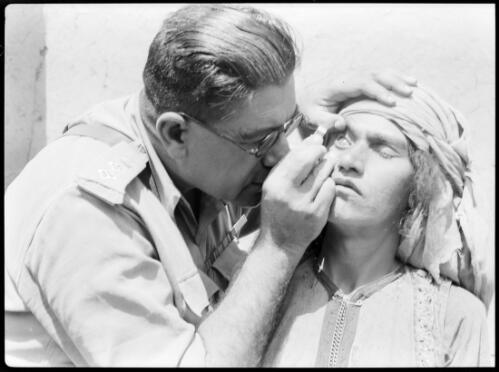 Indian Col Faruki,  an eye specialist finds endless cases for treatment in the villages, over 50% suffer from eye diseases [picture] : [Iran, World War II] / [Frank Hurley]