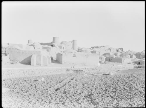 [Town, stone buildings, including a fortress-like structure] [picture] : [Iran, World War II] / [Frank Hurley]